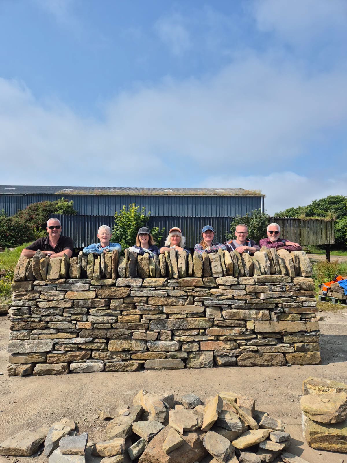 Students building a dry stone wall 2