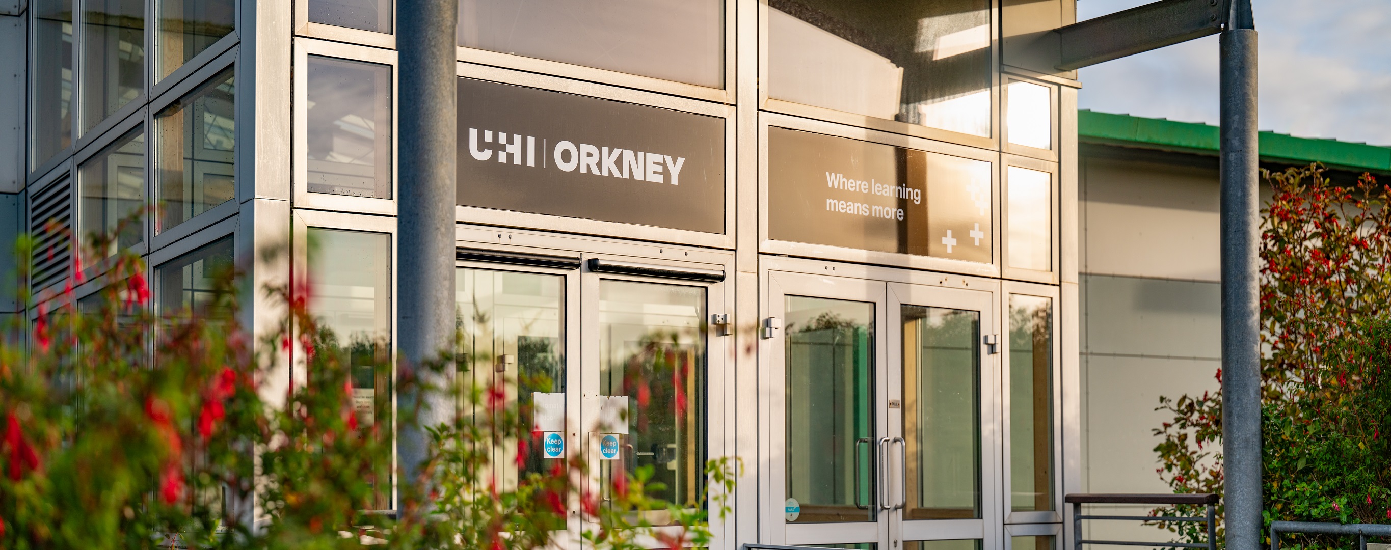Closeup of UHIO entrance with quote 'where learning means more' Closeup of UHIO entrance with quote 'where learning means more'
