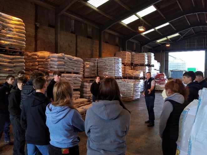 Students visiting Birsay Farmers a local agricultural supplier in Kirkwall Orkney
