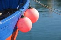Two buoys on the side of a boat